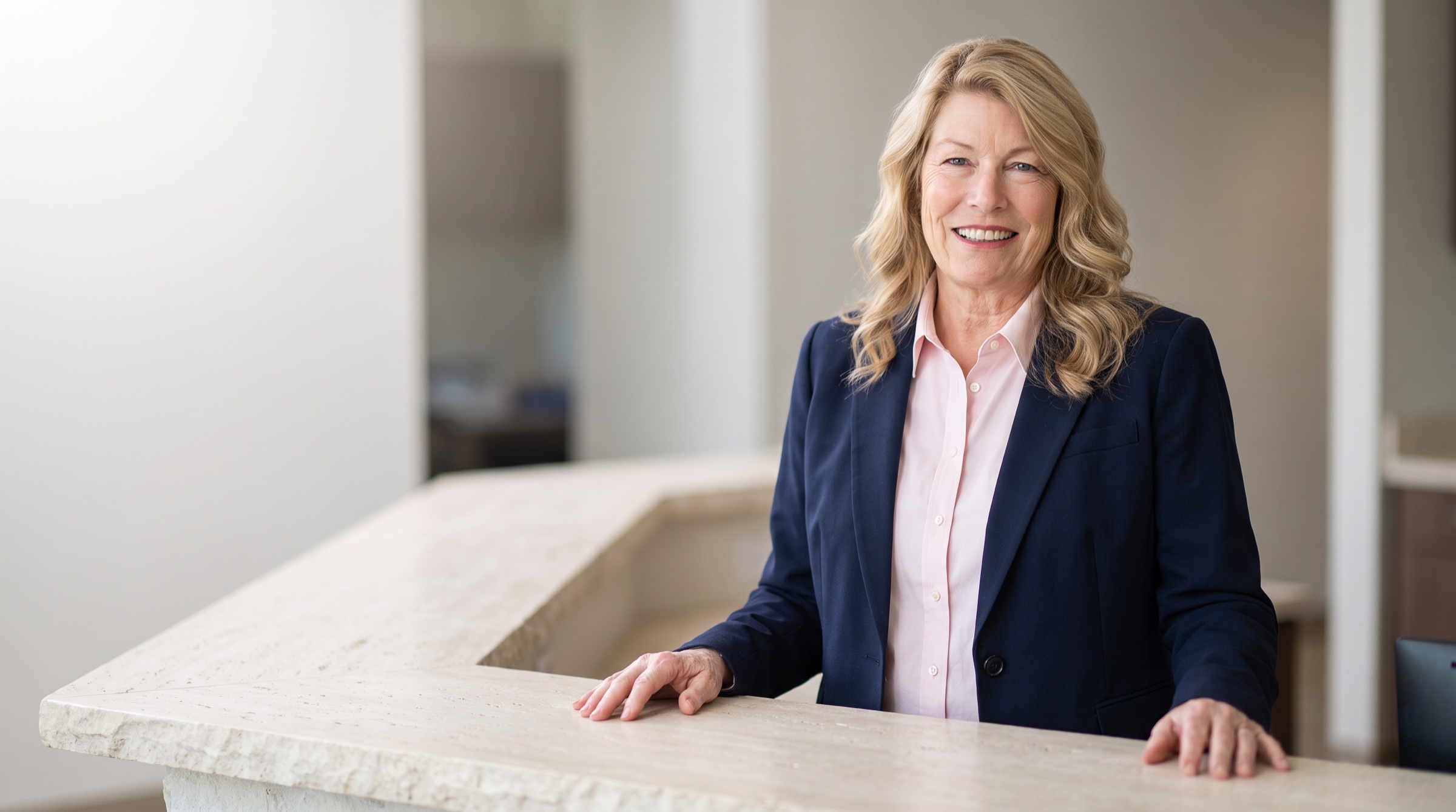 Dr. Lael Forbes at the dispensing counter of her practice